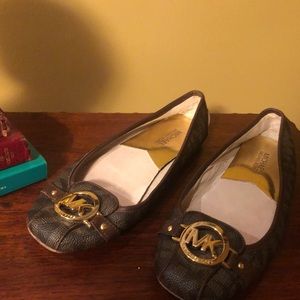 Michael Kors brown signature logo slip ons